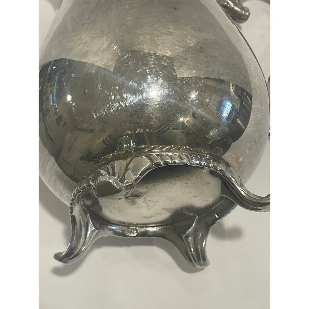 W.M. Rogers Silver Plated Water Pitcher With Guard Preowned in‎ good condition